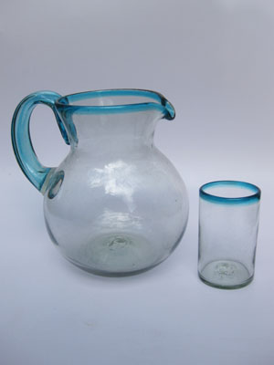 Novedades / Juego de jarra y 6 vasos grandes con borde azul aqua / Transpórtese al mar caribe con éste bello juego de jarra y vasos con borde azul aqua.